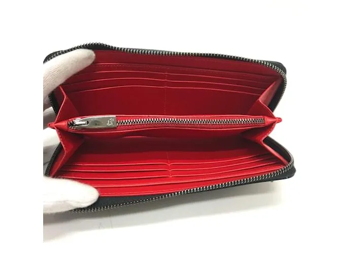 Cartera larga de cuero negro Christian Louboutin 